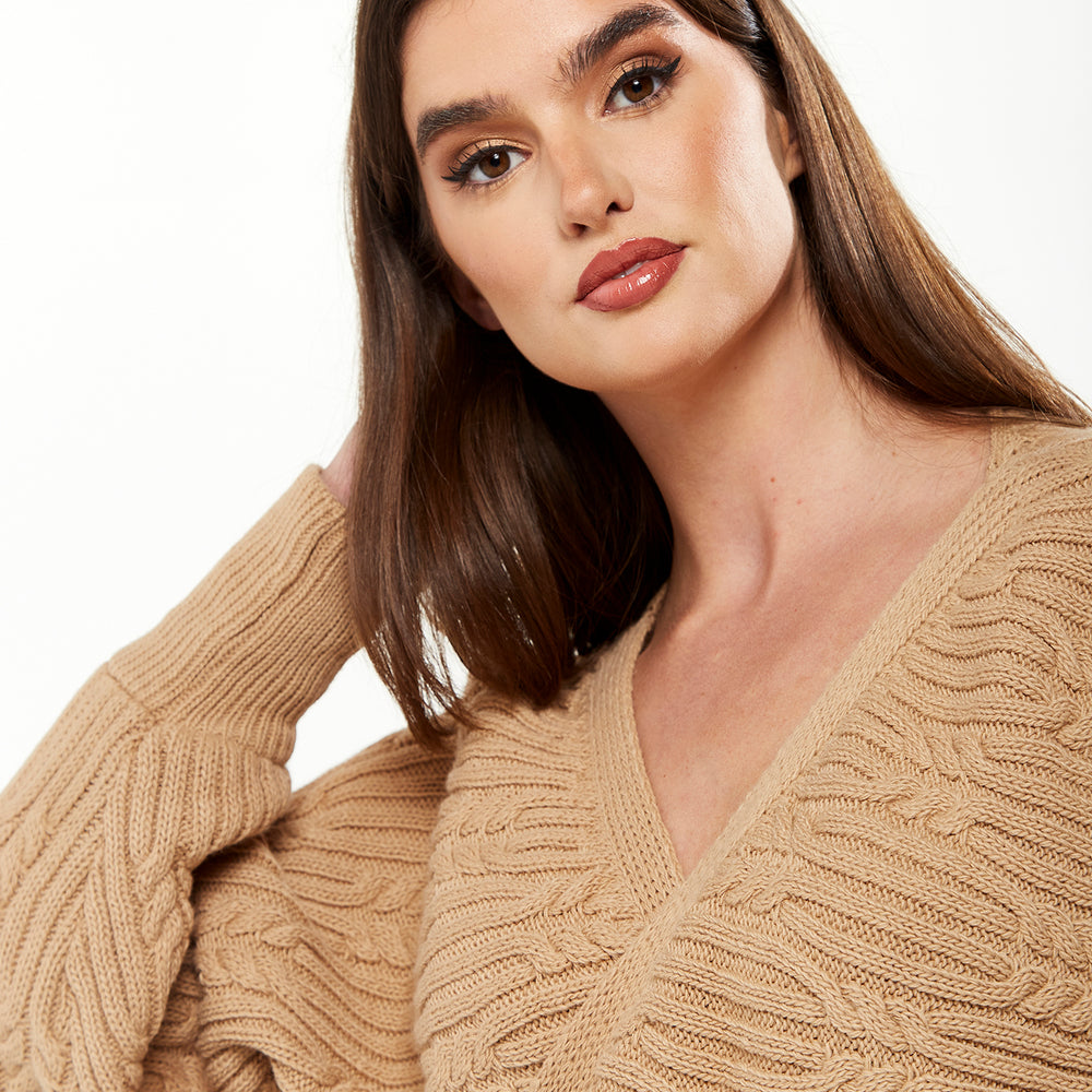 
                  
                    Divine Grace Ribbed Wrap Cardigan in Beige
                  
                