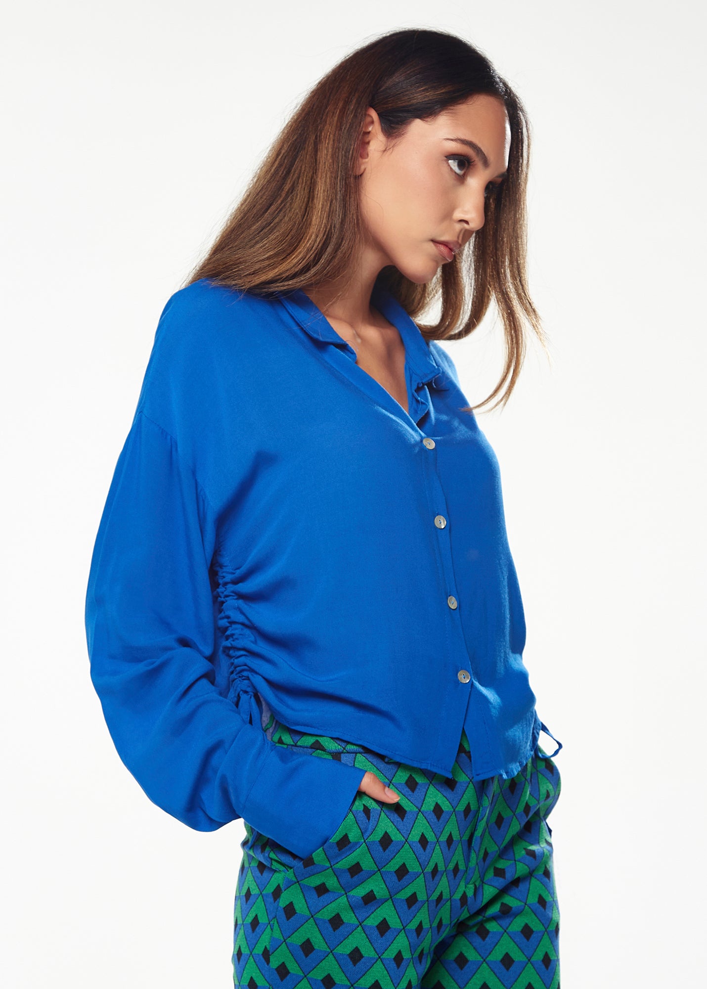 
                  
                    Liquorish Shirt in Blue with Drawstring Detail on the Side
                  
                