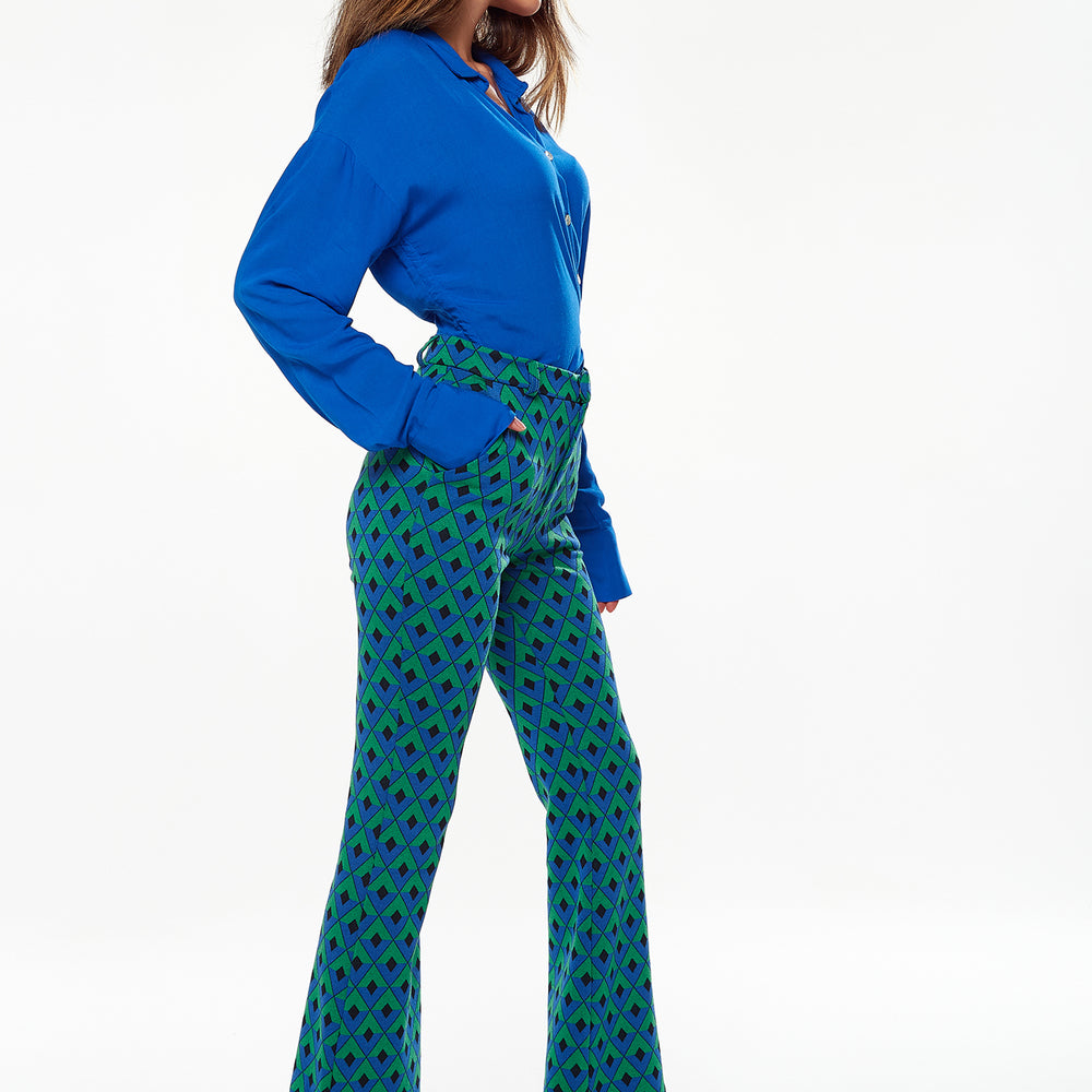 
                  
                    Exclusive Liquorish Knitted Geometric Print Flared Trousers
                  
                
