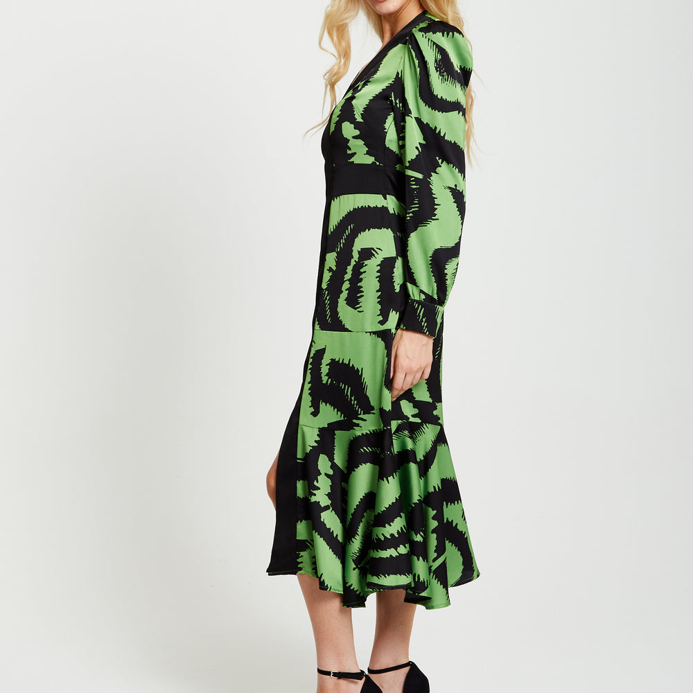 
                  
                    Liquorish Zebra Print Midi Dress With Front Slit And Long Sleeves
                  
                