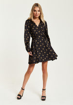 Liquorish Gold Star And Polka Dot Print Mini Wrap Dress With Long Sleeves In Black