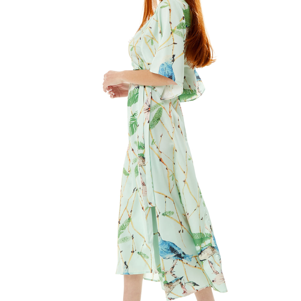 
                  
                    Liquorish Bird Print Maxi Wrap Dress in Mint Green with Green Lace Details
                  
                