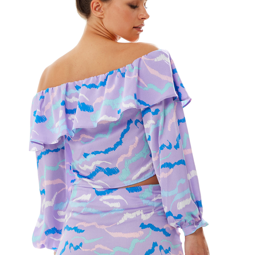 
                  
                    Liquorish Ruffle Long Sleeve Off The Shoulder Top With Sleeve Slits in Lilac
                  
                