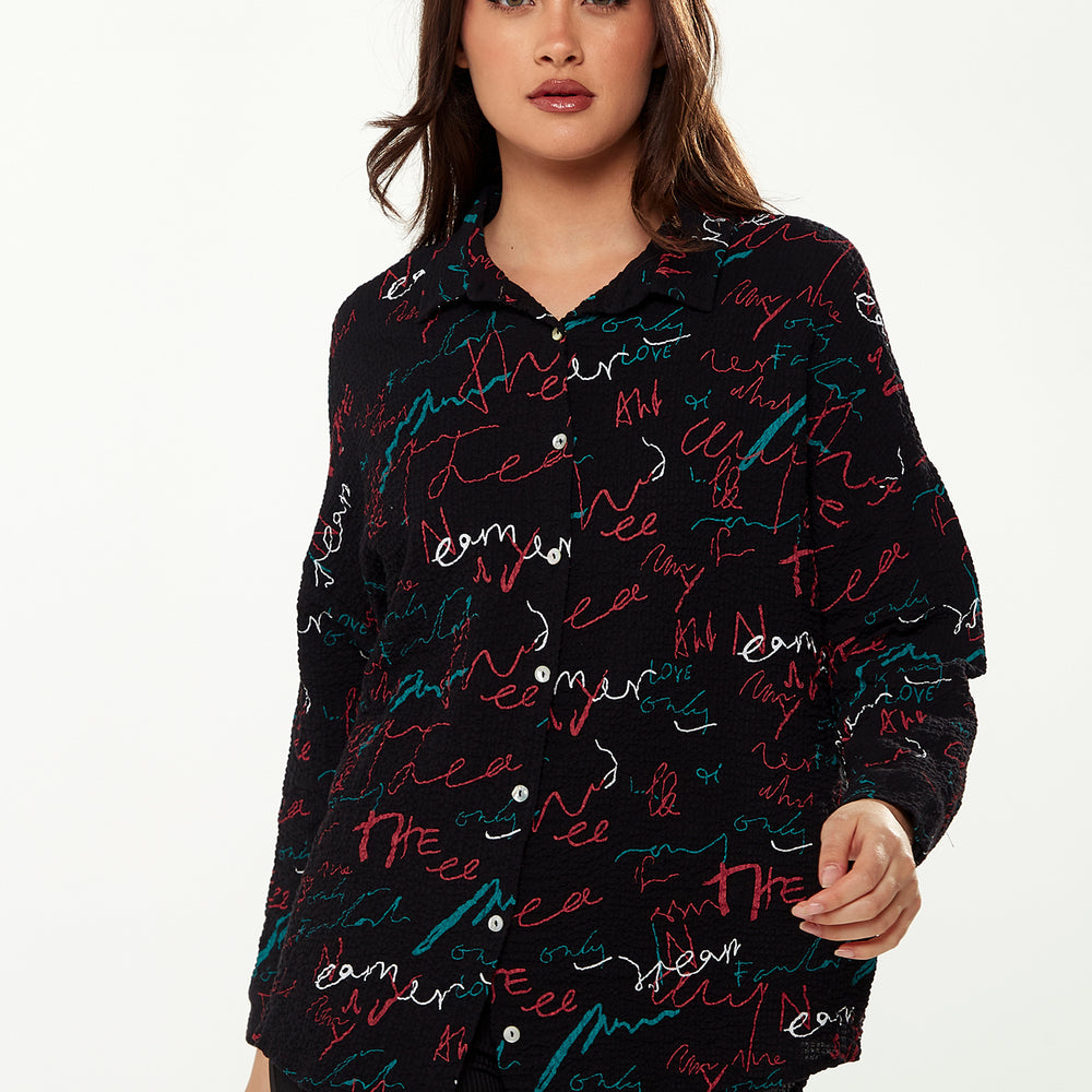
                  
                    Liquorish Shirt with Multicolour Signature Pattern in Black
                  
                