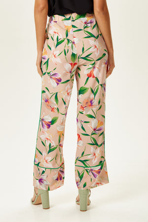Liquorish Trousers in Floral Print with Green Piping