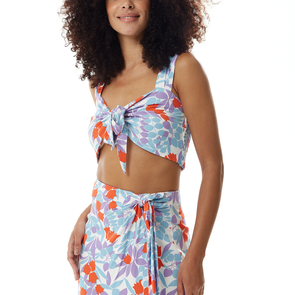 
                  
                    Liquorish Tie Front Floral Print Crop Top in Blue and Red
                  
                